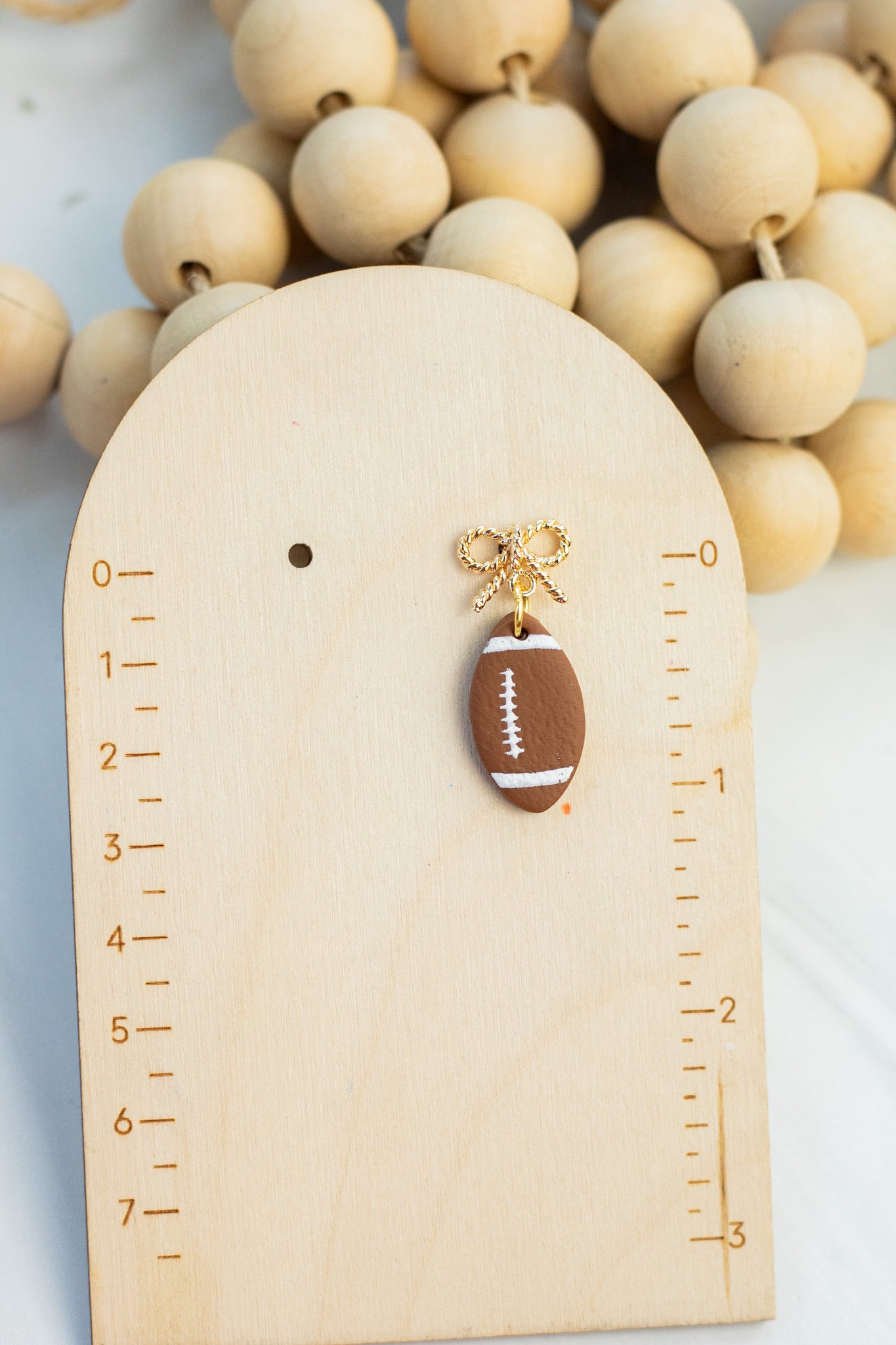 18k Bow Gold Football Dangles
